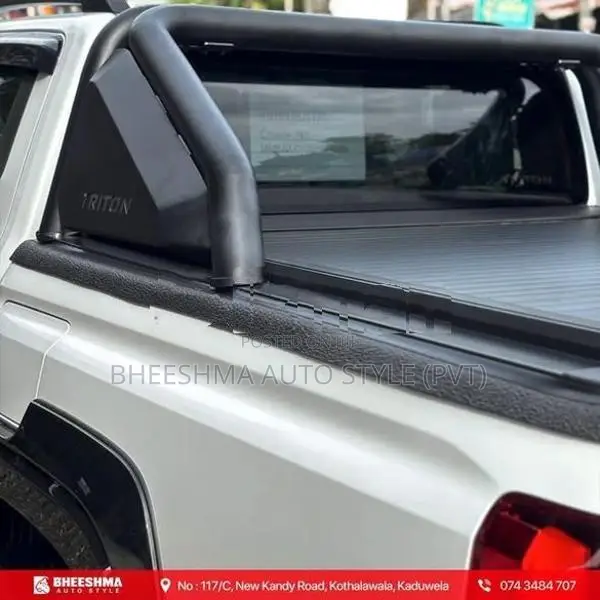 MITSUBISHI TRITON ROLLER SHUTTER MANUAL / ELECTRIC