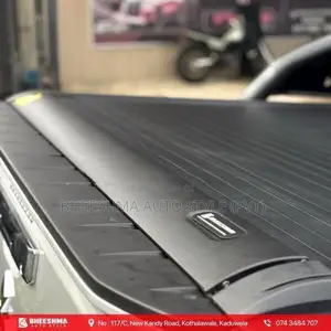 MITSUBISHI TRITON ROLLER SHUTTER MANUAL / ELECTRIC