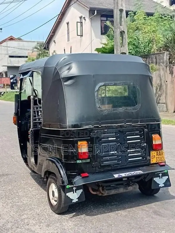 Bajaj RE 2013