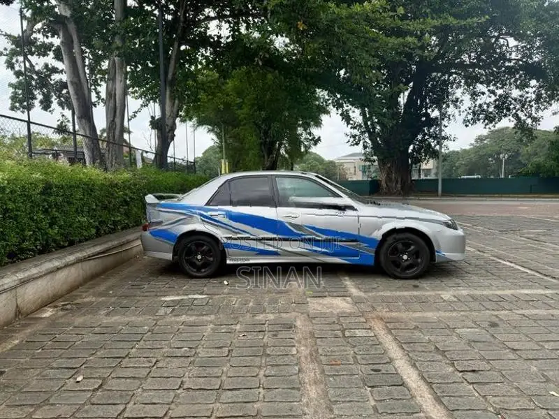 Mazda Familia BJ5P 2000
