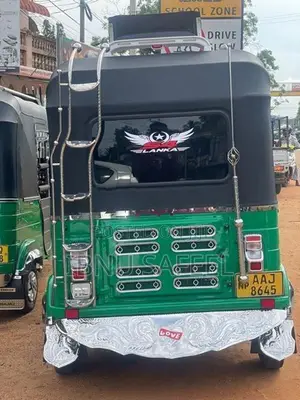 Bajaj RE 2013