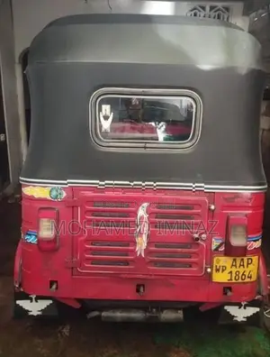 Bajaj RE AAP Threwheel 2014