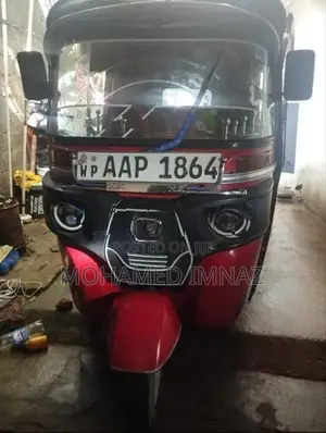 Bajaj RE AAP Threwheel 2014