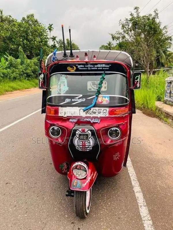 Bajaj RE 2014