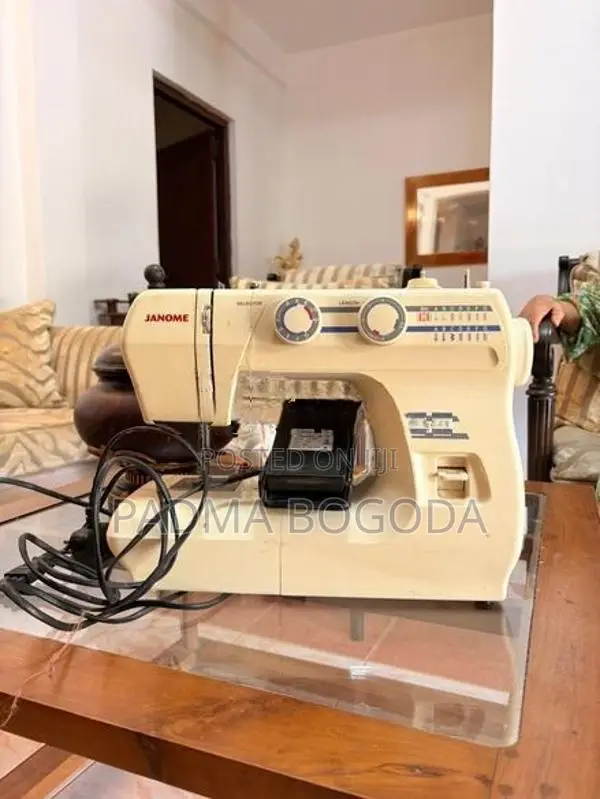 Janome RE1312 Multi-Switch Sewing Machine