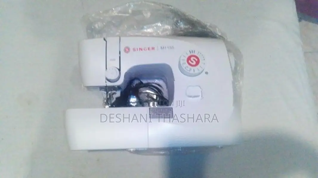 Singer Portable Sewing Machine M1155