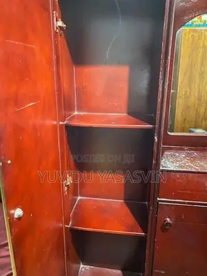 Used Wooden Cupboard Brown Colorwith Mirror With Storage Shelves