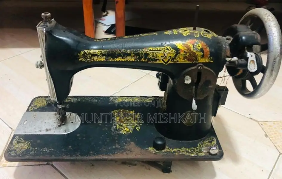 Old Singer Sewing Machine With Heavy-Duty Black Steel Stand