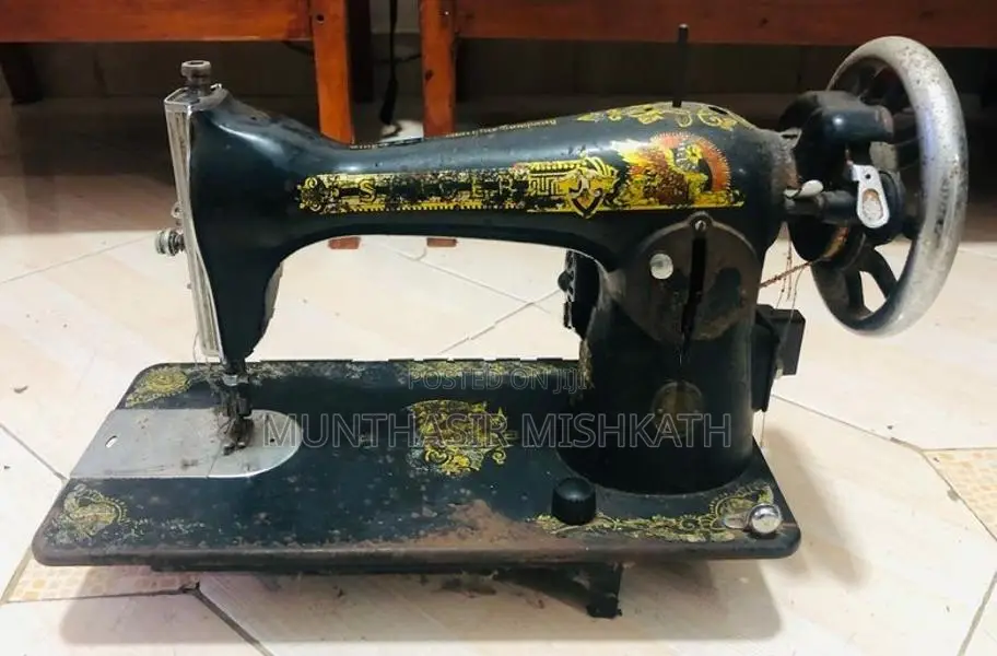Old Singer Sewing Machine With Heavy-Duty Black Steel Stand