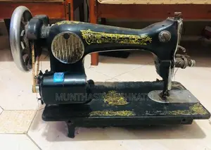 Old Singer Sewing Machine With Heavy-Duty Black Steel Stand